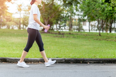 woman walking down the road