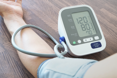 person monitoring blood pressure